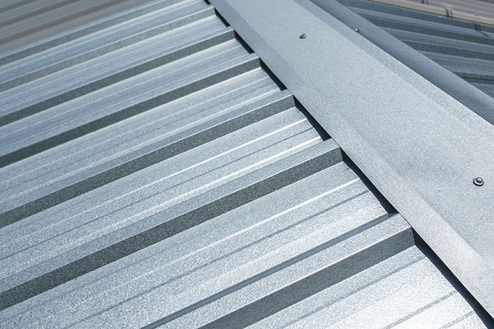 Metal sheet roofing